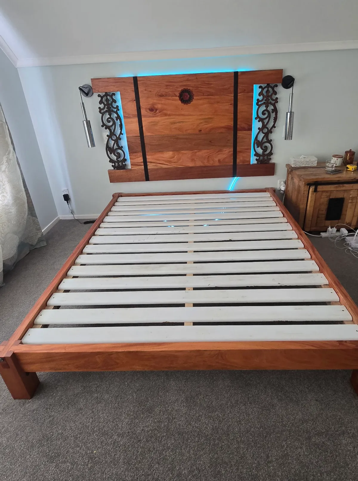 Timber bed frame with backlit headboard